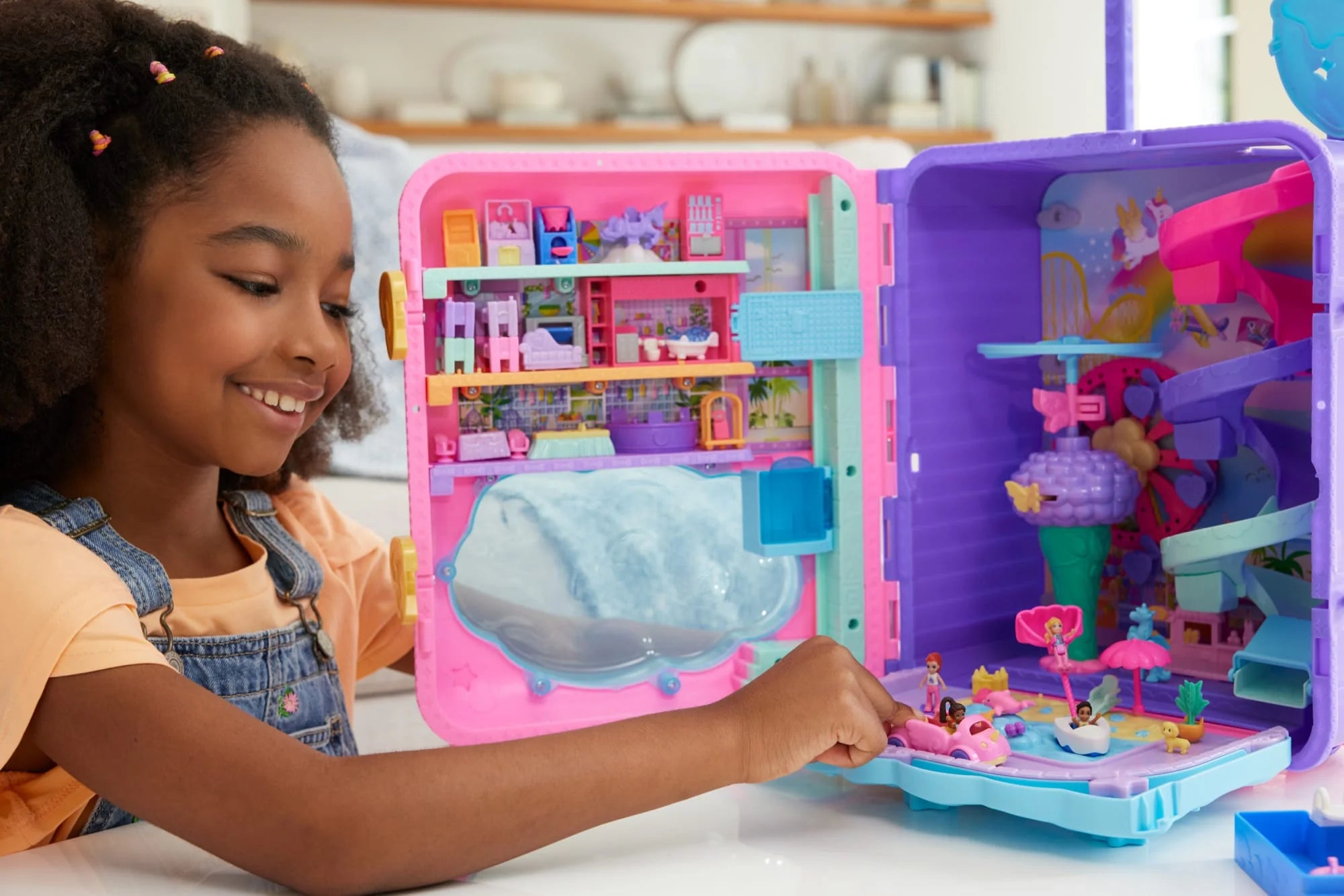 Polly Pocket Pollyville Resort Roll-Away Playset with 4 Dolls, 1 Vehicle & 25+ Accessories