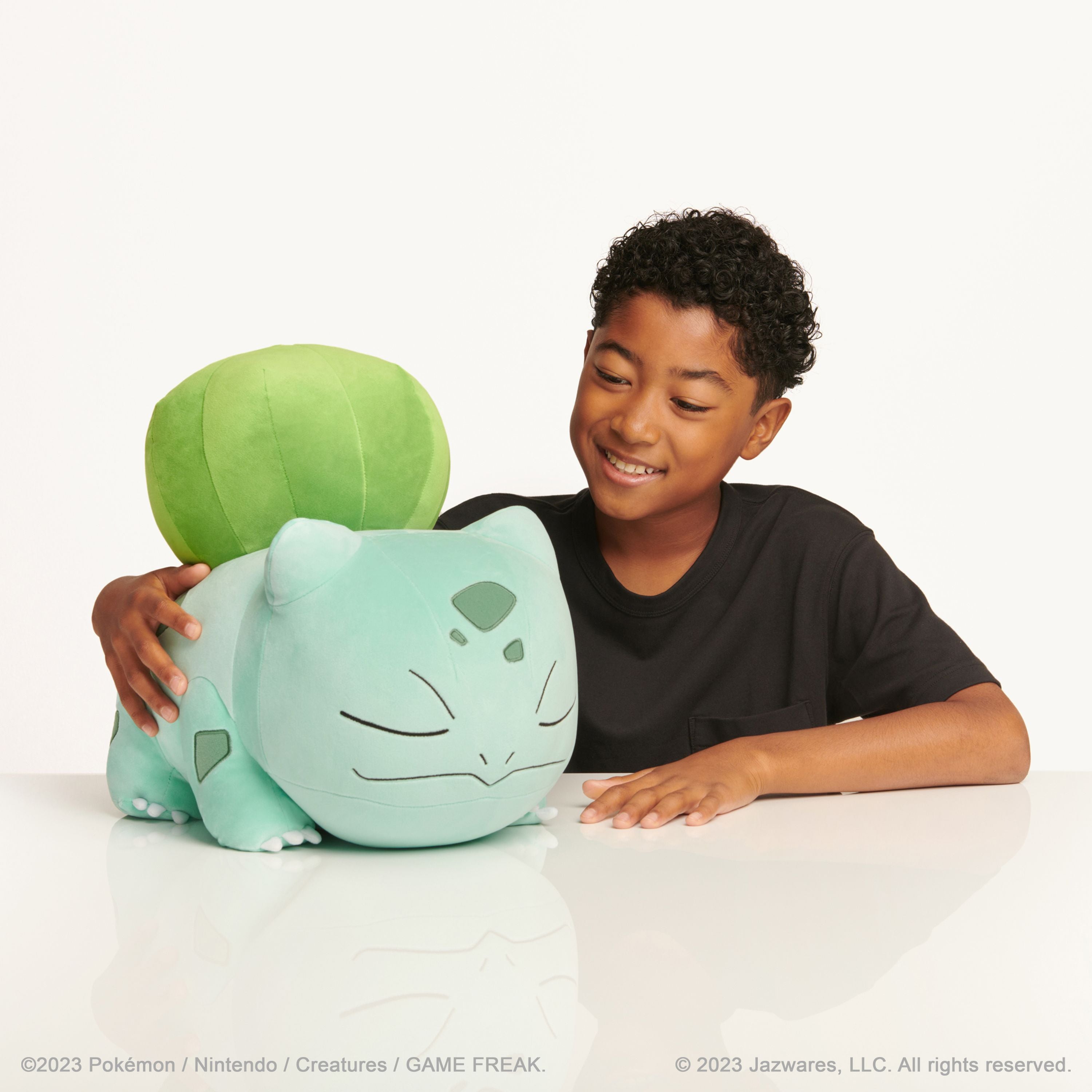 Get This 18-Inch Sleeping Bulbasaur Plush Toy for Pokémon Fans - Great Deal!